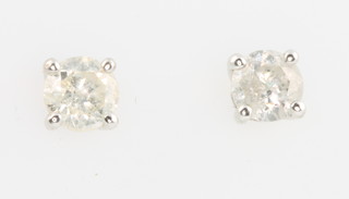 A pair of 18ct white gold single stone ear studs approx. 0.80ct 
