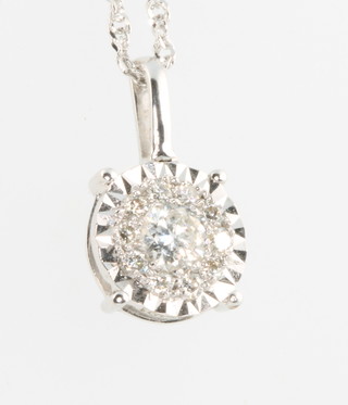 An 18ct white gold diamond pendant approx. 0.25ct on a 9ct white gold chain 