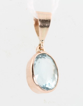 A 9ct yellow gold aquamarine pendant 