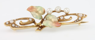 An Art Nouveau 15ct yellow gold enamel and seed pearl bar brooch 