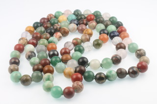 A string of semi-precious beads - rose quartz, agate, banded agate, jade etc 
