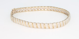 A 9ct yellow gold diamond set bracelet