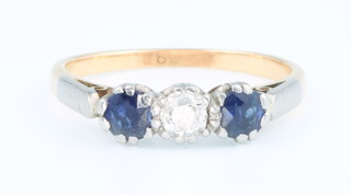 A yellow gold diamond and sapphire stone ring, size O
