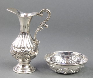 A 900 standard silver fluted jug together with a pierced silver trinket dish, 99 grams