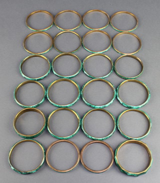 A quantity of inlaid malachite bracelets 