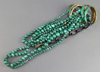 A quantity of malachite bead necklaces and bangles