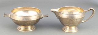 A silver Art Deco cream jug and sugar bowl London 1934, 340 grams