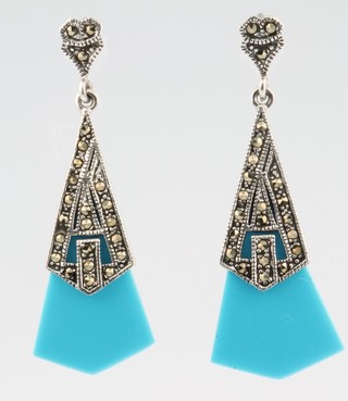 A pair of silver and turquoise drop earrings 