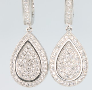 A pair of silver cubic zirconia pear shaped drop earrings 
