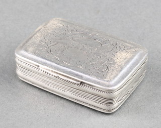 A Georgian rounded rectangular silver vinaigrette with chased scroll decoration and floral gilt grill 1.5" x 1" 