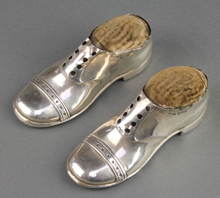 A pair of silver novelty pin cushions in the form of shoes with oak soles Birmingham 1911 5" 