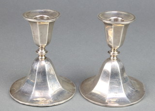 A pair of octagonal silver dwarf candlesticks with waisted stems Birmingham 1938 4 1/4" 