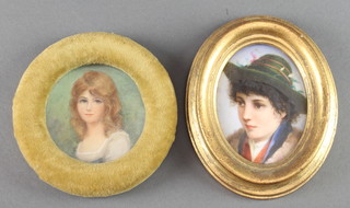 A 19th Century Continental porcelain plaque decorated with a study of a young boy in a gilt frame 4" x 3 1/2", a watercolour on ivory portrait miniature of a young girl 2" 