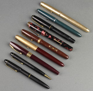 A Cross burgundy fountain pen with 14ct nib, 6 others, a propelling pencil and ballpoint pen 