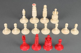 A stained and turned part chess set comprising 16 pieces 