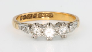 A 22ct yellow gold 3 stone diamond ring size  L 1/2