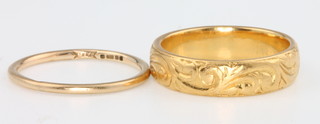 A 22ct yellow gold wedding band size M 6 grams and a 9ct gold ditto size K 1/2 0.7grams 