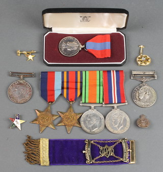 A General Service medal with Northern Ireland bar to 22437253 SIG.T.Pearce.R.Signals together with a Defence medal and a WWII group comprising 1939-45 and Burma Star, Defence and War medal, an Imperial Service medal to Miss Audrey May Jupp together with minor gilt Masonic badges and jewels  
