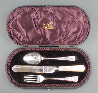 A Victorian 3 piece silver and mother of pearl christening set of knife, fork and spoon, Sheffield 1891, contained in a fitted case 