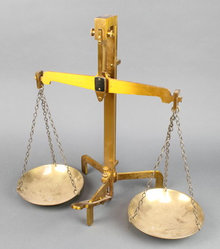 A pair of Class B brass bank scales marked To weigh 100 ounces - Troy 