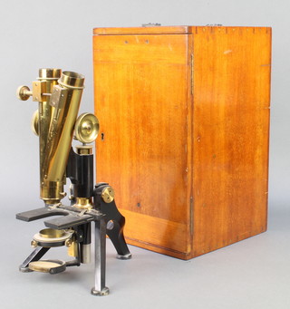 G Baker 244 HIgh Holborn London, a binocular microscope with 4 eye pieces, 4 lenses 2", 1", 3/1 and 1/6 and magnifying stand, numbered 6038