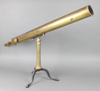 Broadhurst Clarkson & Co. of 63 Farringdon Road London EC, a 19th Century brass table telescope, raised on a folding tripod base 21" x 37" together with an associated draw section and lens cap 