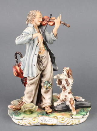 A Capodimonte figure of a tramp violinist 9" 