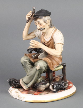 A Capodimonte figure of a cobbler 9" 