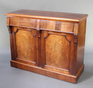 A Victorian mahogany chiffonier fitted 2 drawers above double panelled doors, raised on a platform base 39"h x 50"w x 19 1/2"d 