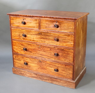 A 19th Century mahogany chest of 2 short and 3 long drawers, raised on a platform vase with tore handles and brass escutcheons 39 1/2"h x 43 1/2"w x 22"d 
