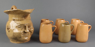 A Shillelagh Irish Studio Pottery character lemonade jug together with 6 beakers