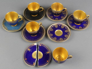 An Edwardian Royal Worcester blue and gilt coffee set comprising 6 cups and 7 saucers 