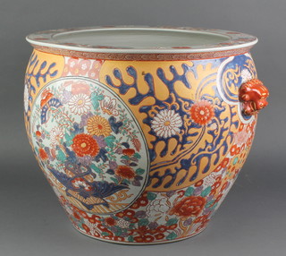 A mid 20th Century Chinese jardiniere with lion handles, panels of flowers and insects 16" 