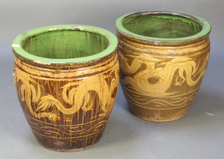 A pair of 20th Century Chinese slip glaze jardinieres decorated with dragons 19"h x 19" diam. 
