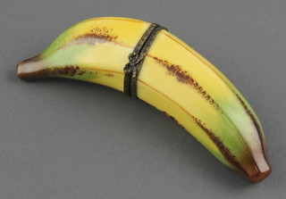 A modern Limoges trinket box in the form of a banana 5" 