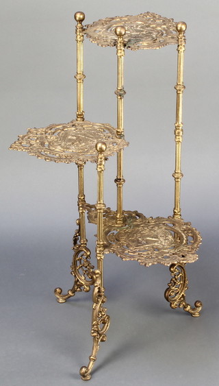 A Victorian style pierced brass 3 tier plant stand with embossed stag decoration 28 1/2"h x 19"w x 15"d 