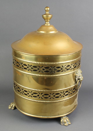 A cylindrical Adam style pierced brass coal bucket with acorn finial 12"h x 12" diam. 