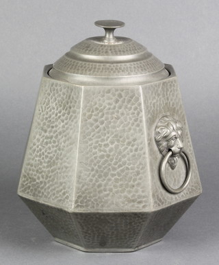 An Art Deco Argent planished pewter octagonal twin handle biscuit barrel with lion mask handles, the base marked Argent Pewter no.1045 6 1/2"  