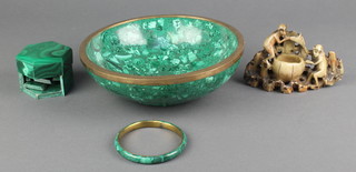 A turned malachite bowl 2" x 8" diam., ditto hexagonal jar and cover 2"h x 2 1/2"w x 2"d, ditto bangle and a soapstone brush pot decorated monkeys 3" 