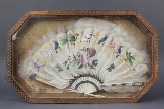 A 19th Century ivory and painted ostrich feather fan contained in a lozenge shaped leather case 2" x 21" x 13"