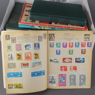 A green album of used World stamps - Hungary, Italy, Netherlands, Portugal, Romania, Spain, 4 albums of schoolboy stamps, an album of first day covers, an empty Stanley Gibbons Imperial stamp album, ditto Schaubek Israel (empty) 