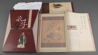 A limited edition silk stamp album of Confucius 