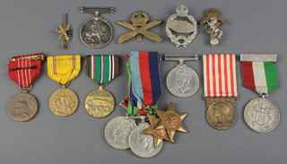 A British War medal to Albert E Thurgood Merchant Seaman, 39-45 Star, France and Germany Star, British War medal (x2), Defence medal, Bexhill Ambulance Brigade medal, a Great War commemorative medal, an American Defence medal 1941, European-African-Middle East campaign medal, Freedom medal, 3 cap badges and a sweetheart brooch 