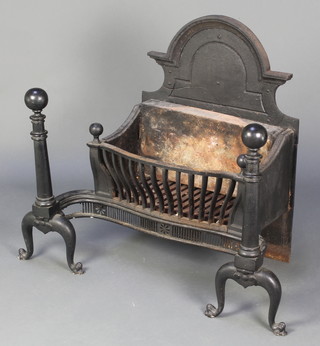 A 19th Century cast iron fire grate incorporating an arched fire back 29"h x 36"w x 20"d 