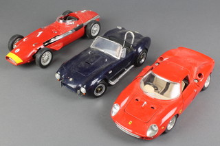 A Polistil model of a Maserati 250F, ditto Burago Ferrari Le Mans 250 (1965), ditto Rodelgo a Shelby Cobra 427 