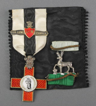 A silver gilt and enamelled breast badge - Order of the League of Mercy with Long Service bar together with a silver brooch in the form of a standing hound and 2 ribbons 