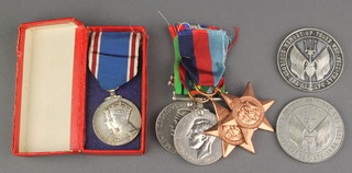 A George VI Coronation medal contained in a George V Jubilee box, a pair - British War medal and Defence medal, 2 facsimile stars 1939 and Pacific, 2 commemorative medallions May 31 1916 German Fleet