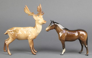 A Beswick figure of stag standing, no.981 8" together with a ditto horse 5" 