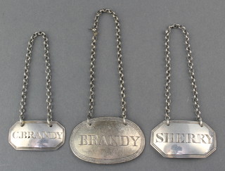 A Georgian silver spirit label Sherry 1826, 2 ditto C.Brandy and Brandy 