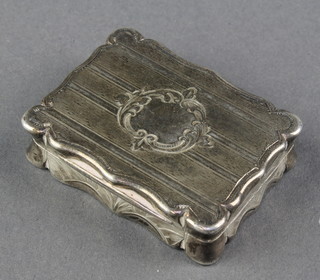 A Victorian rectangular silver vinaigrette with engine turned decoration and vacant cartouche with pierced floral grill, Birmingham 1860 1 1/4" 